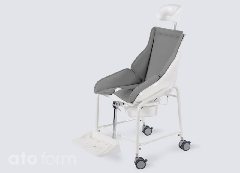 TS-Schale with headrest, padded upholstery and parallelogram footrest