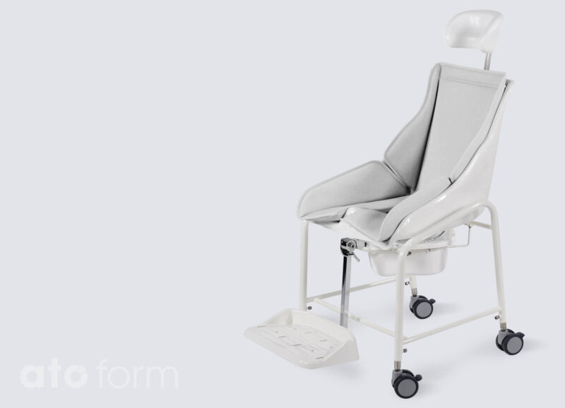 TS-Schale with headrest, padded upholstery and parallelogram footrest